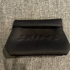 Skims makeup bag